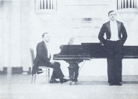 N.K. Pechkovsky at the concert, at the piano - V.P. Ulrich. The photo. (Н.К. Печковский на концерте, у рояля - В.П. Ульрих. Фотография.) (Belyaev)